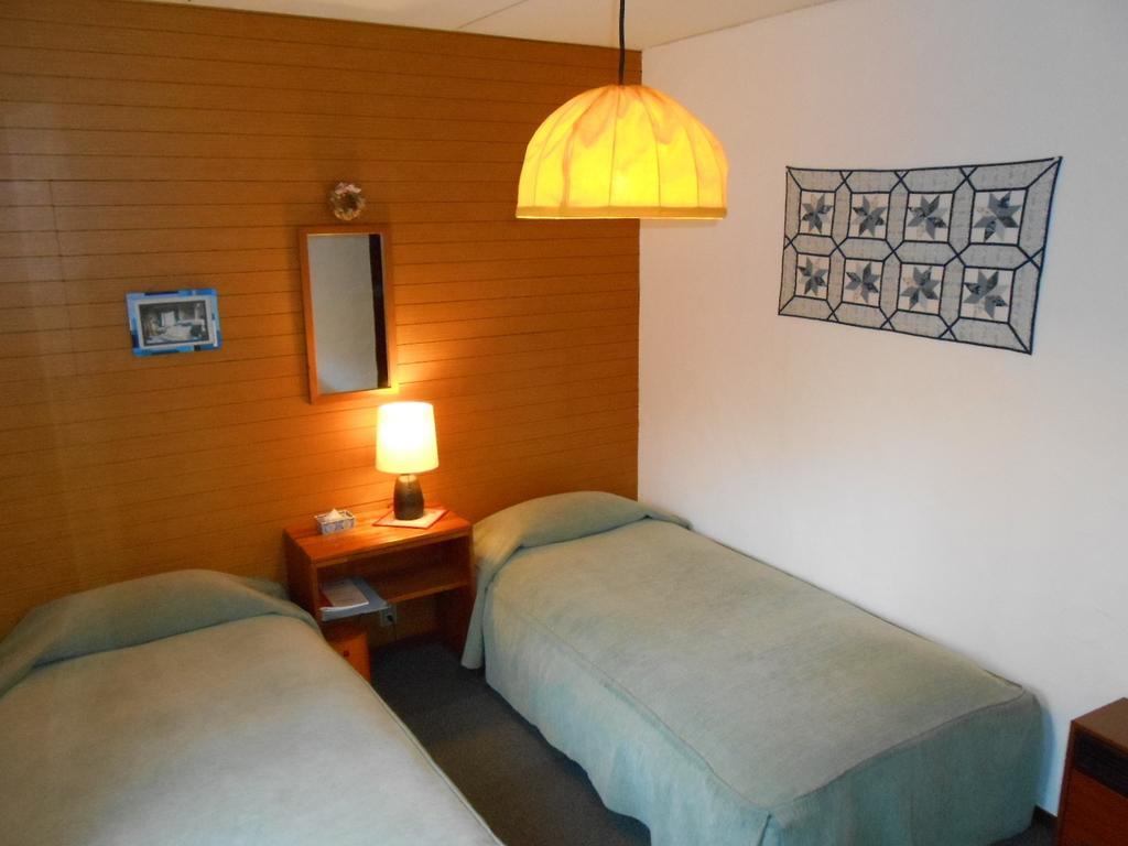 Pension Nugget Inn Hakuba Quarto foto